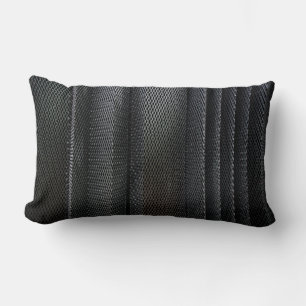 A metal criss-cross grid in undulating layers lumbar cushion