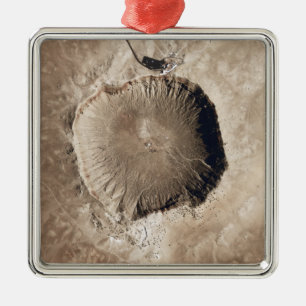 A meteorite impact crater metal tree decoration
