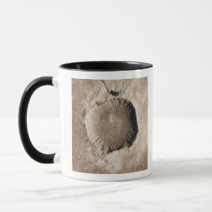 A meteorite impact crater mug