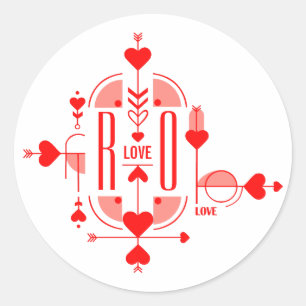 A modern and romantic monogram initial design classic round sticker