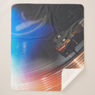 A modern turntable to play music on audio disc. Hi Sherpa Blanket