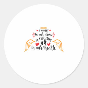A moment in our arms a lifetime in our hearts blac classic round sticker
