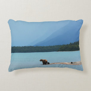 A MOTHER BEAR TEACHES HER CUBS TO SWIM ON THE EDGE DECORATIVE CUSHION