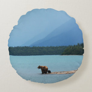 A MOTHER BEAR TEACHES HER CUBS TO SWIM ON THE EDGE ROUND CUSHION