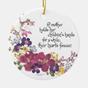 A Mother holds a child's heart Ceramic Ornament