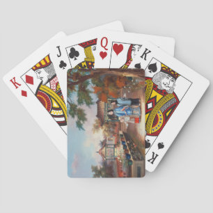 A mother with her children in a chinese garden, c. playing cards