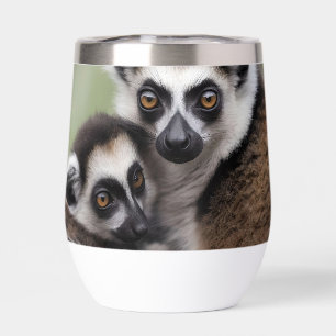 **"A Mother's Love: Mummy and Baby Lemur Cuddling"