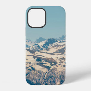 A mountain range with thawing snow and ice in the iPhone 12 case