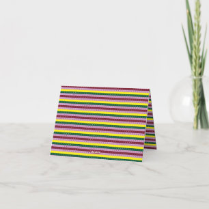 a multicolored striped background with dots thank you card