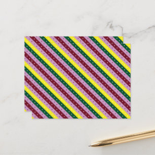 a multicolored striped pattern with dots postcard