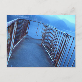 A mysterious and blue-gray and desolate seaside postcard