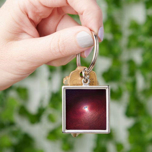 A Neutron Star With A Disc Of Warm Dust. Key Ring (Hand)