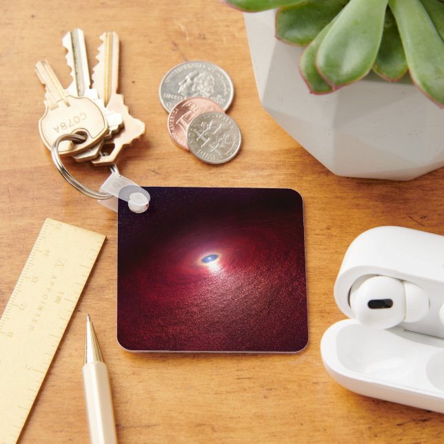 A Neutron Star With A Disc Of Warm Dust. Key Ring (Desk)