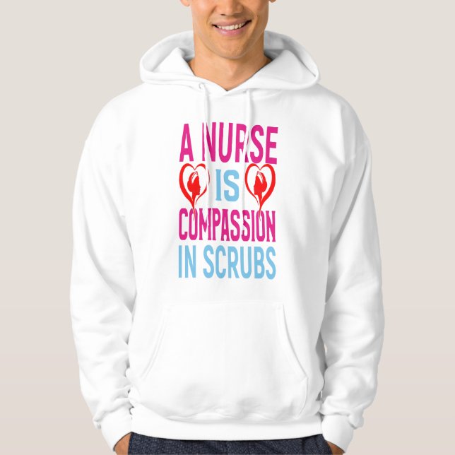 A Nurse Is Compassion In Scrubs Hoodie (Front)
