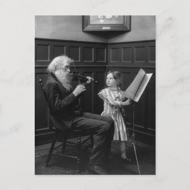 A Page Turner, early 1900s Postcard (Front)