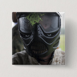 A paintball round 15 cm square badge
