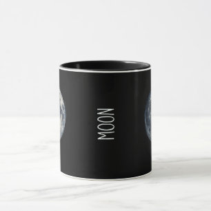 A painting of the moon in a space mug