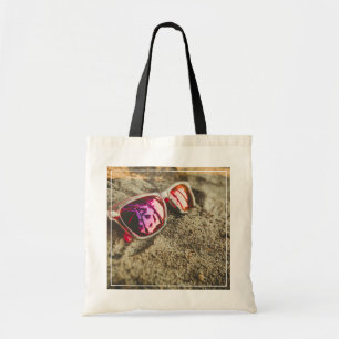 A Pair Of Fashionable Sunglasses On The Beach Tote Bag