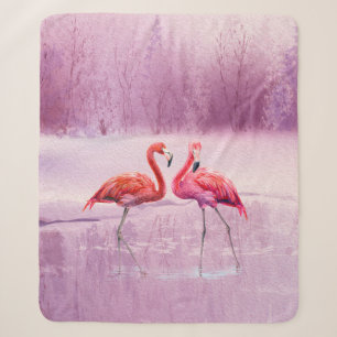 A pair of pink flamingos stand in the water on the sherpa blanket
