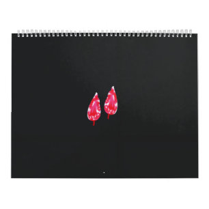 a pair of red leaves on a black background calendar