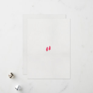 a pair of red leaves on a black background holiday card