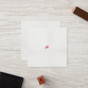 a pair of red leaves on a black background loyalty card