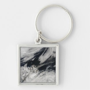 A pale grey ash plume blows from the summit key ring