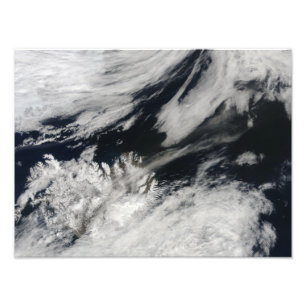 A pale grey ash plume blows from the summit photo print