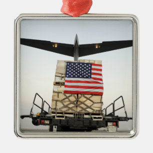 A pallet containing humanitarian relief supplie metal tree decoration