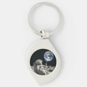 A panda smoking a cigarette on the moon key ring