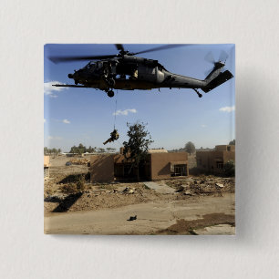 A pararescueman rappels from an HH-60 2 15 Cm Square Badge