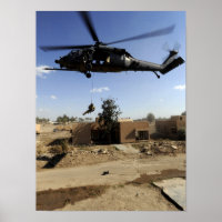 A pararescueman rappels from an HH-60 2