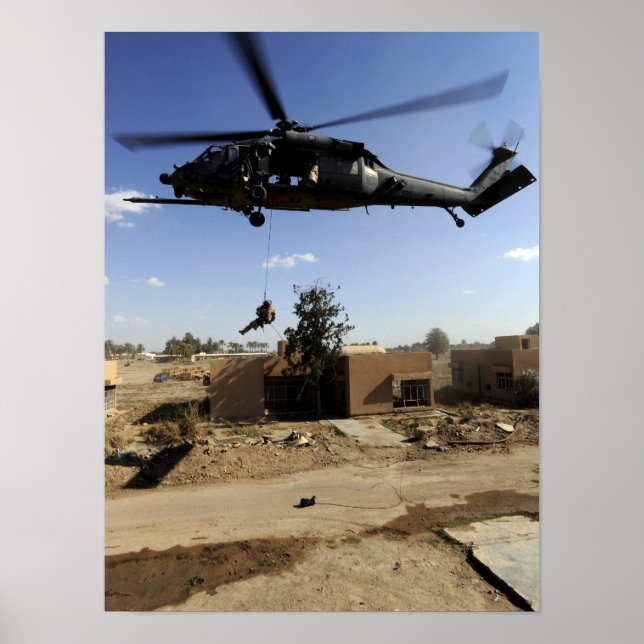 A pararescueman rappels from an HH-60 2 Poster (Front)