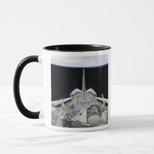 A partial view of Space Shuttle Mug