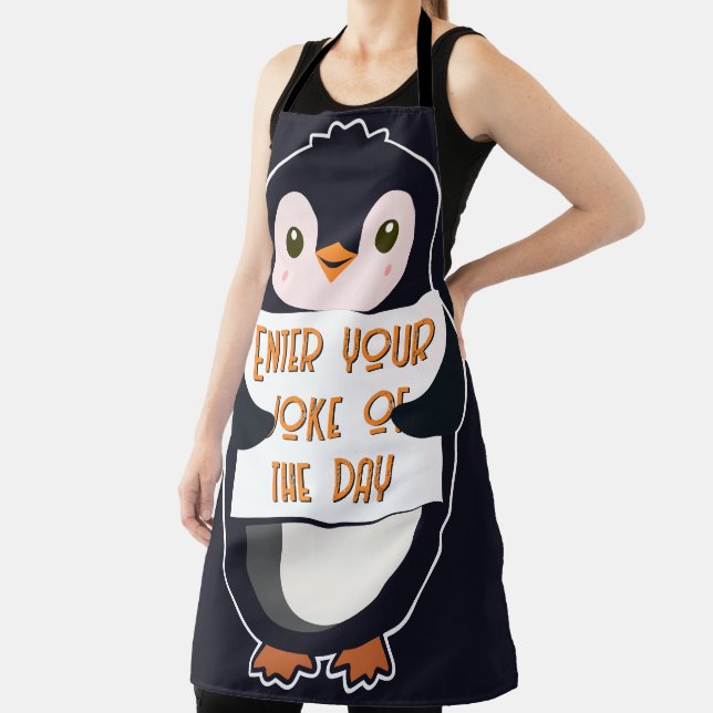 A penguin holding a sign with custom text apron (Insitu)