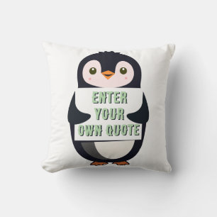 A penguin holding a sign with customizable text th cushion