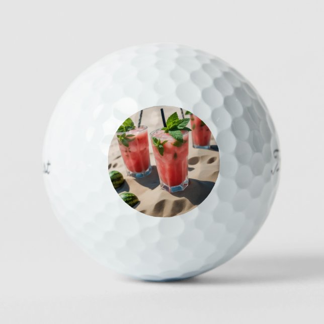 A photo of a colourful watermelon mojito with mint golf balls (Front)