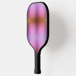 A pickleball paddle with a gradient pink