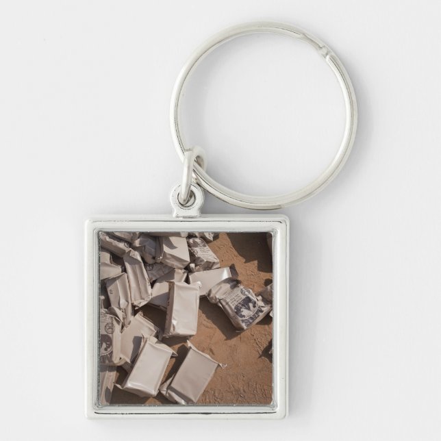 A pile of Meals Ready to Eat Key Ring (Front)