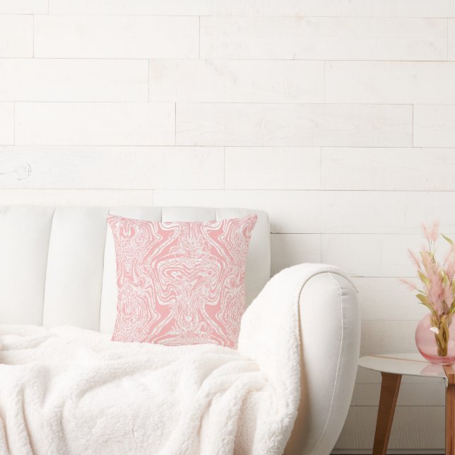 a pink and white abstract design on a white backgr cushion (Couch)