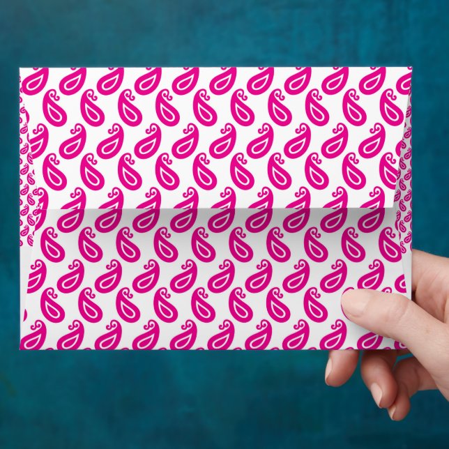 a pink and white background with a pattern envelope (Hand)