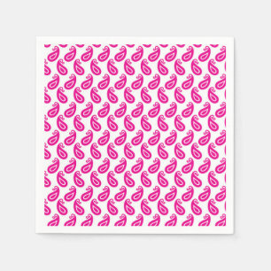 a pink and white background with a pattern napkin