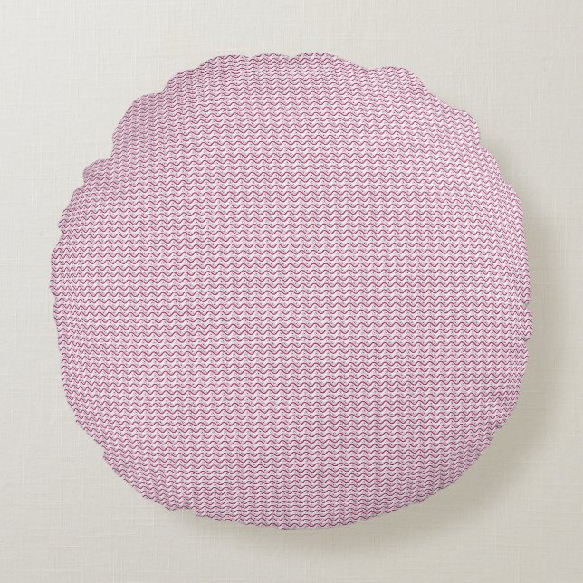 a pink and white background with wavy lines round cushion (Front)