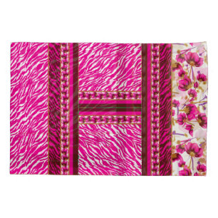 a pink and white wallpaper with a cross on it pillowcase
