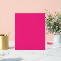 a pink background with a black border