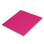 a pink background with a black border ceramic tile<br><div class="desc">The design is a large blue square,  which appears to be a bright and clear sky. The colour of the sky is a deep shade of blue,  giving it a vibrant and lively appearance.</div>