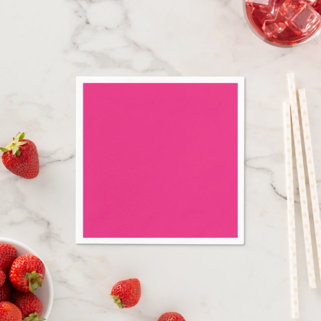 a pink background with a black border napkin (Insitu)