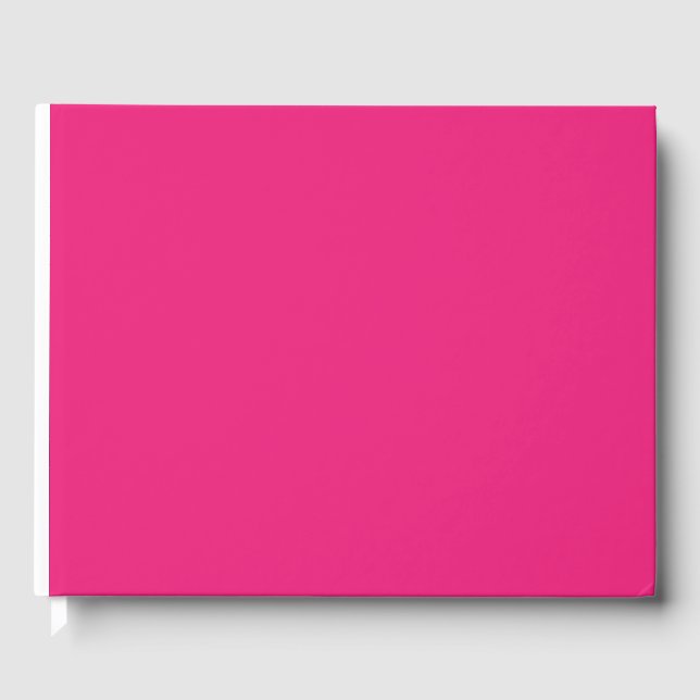 a pink background with a black guest book (Front)