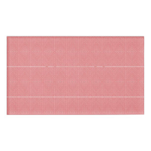 a pink background with a pattern in the middle_ name tag