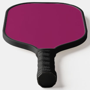 a pink background with a white border pickleball paddle